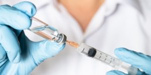 EEOC Targets Michigan Hospital Over Alleged Violation of Flu Shot Requirements